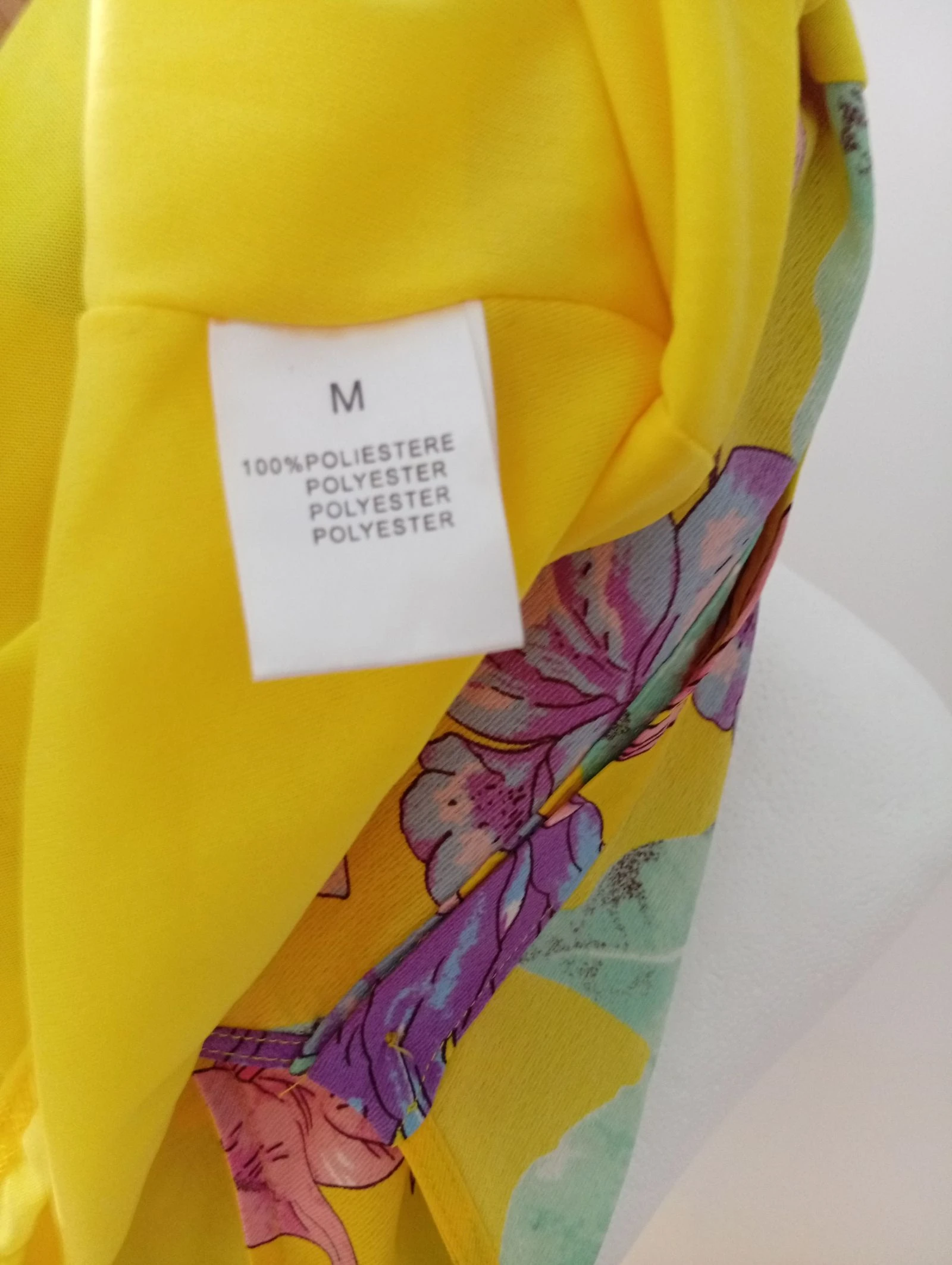 Vestido floral com botões, alças finas e laços cruzados nas costas – photo 4